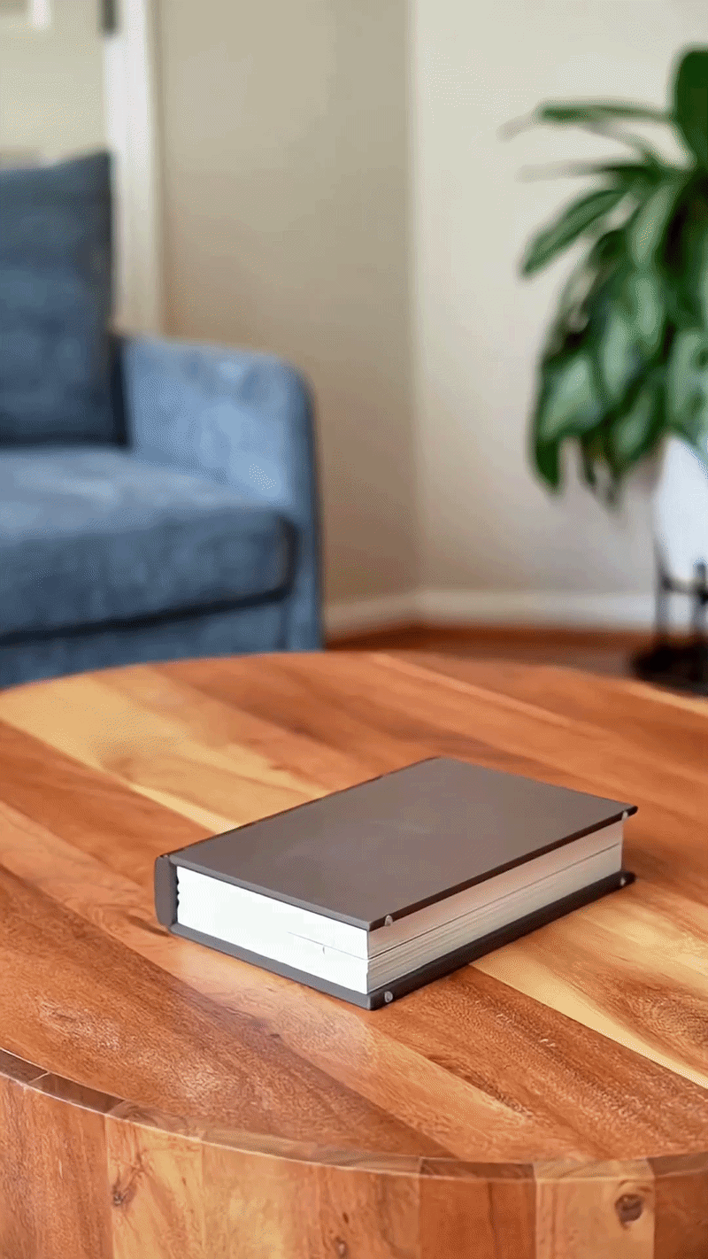 ChessBook unfolding: a book opens to reveal a full chess board with all 32 pieces