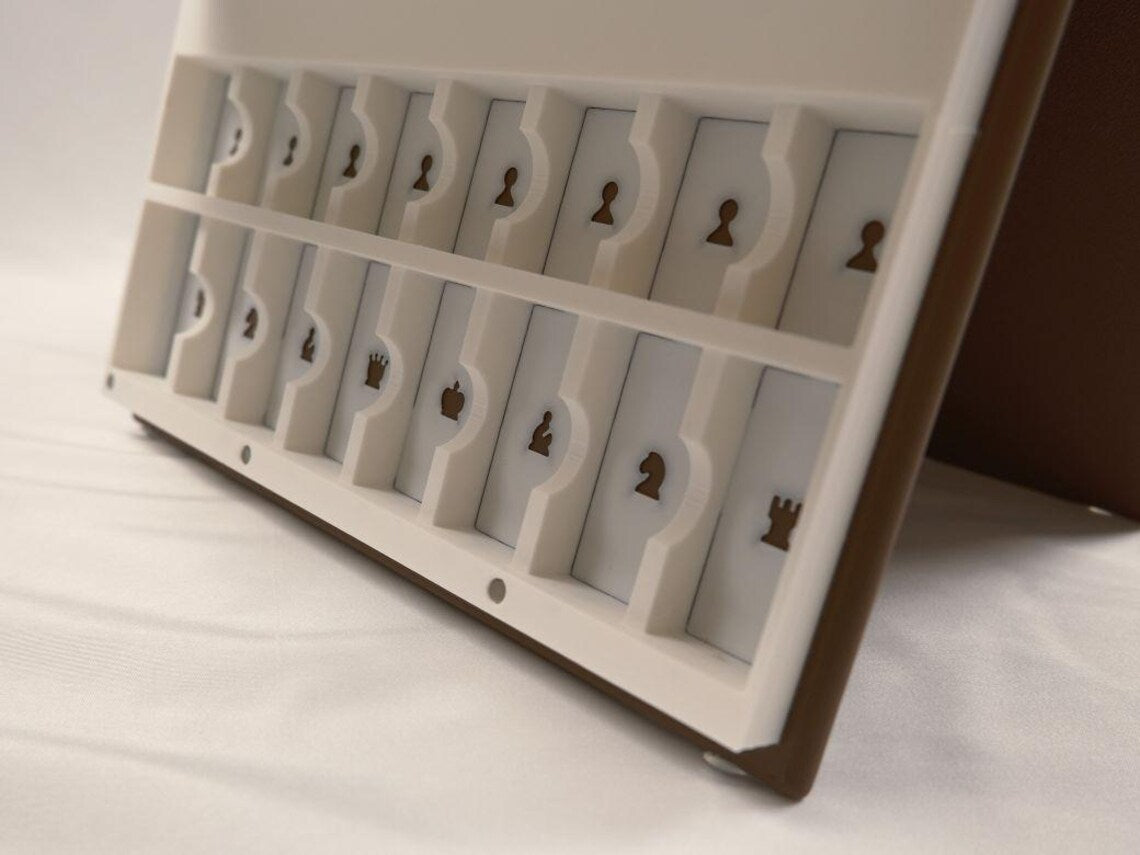 ChessBook showing all pieces stored inside the book